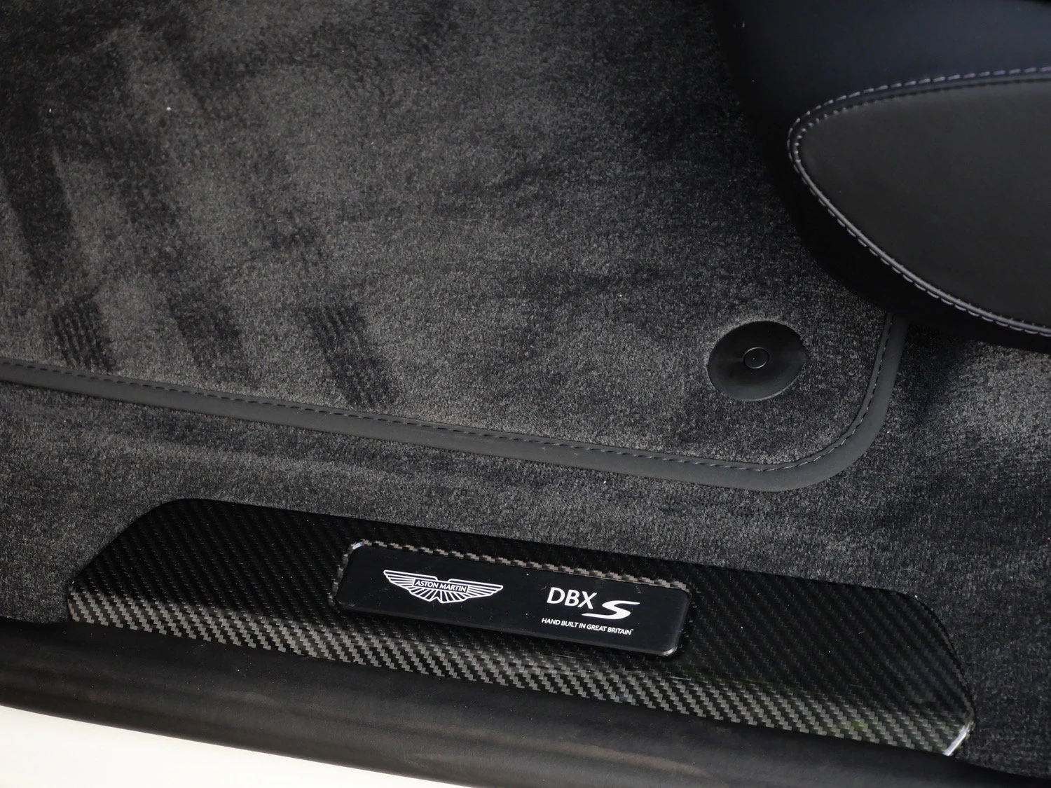 2026 Aston Martin DBX S interior, door sill, Onyx Black - Semi Aniline