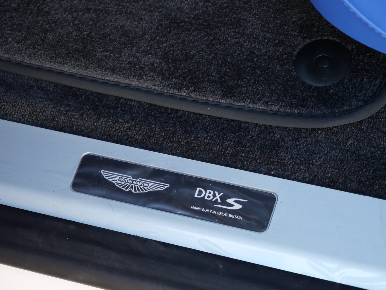 2026 Aston Martin DBX S interior, door sill, Cote D Azur Blue - Semi Aniline