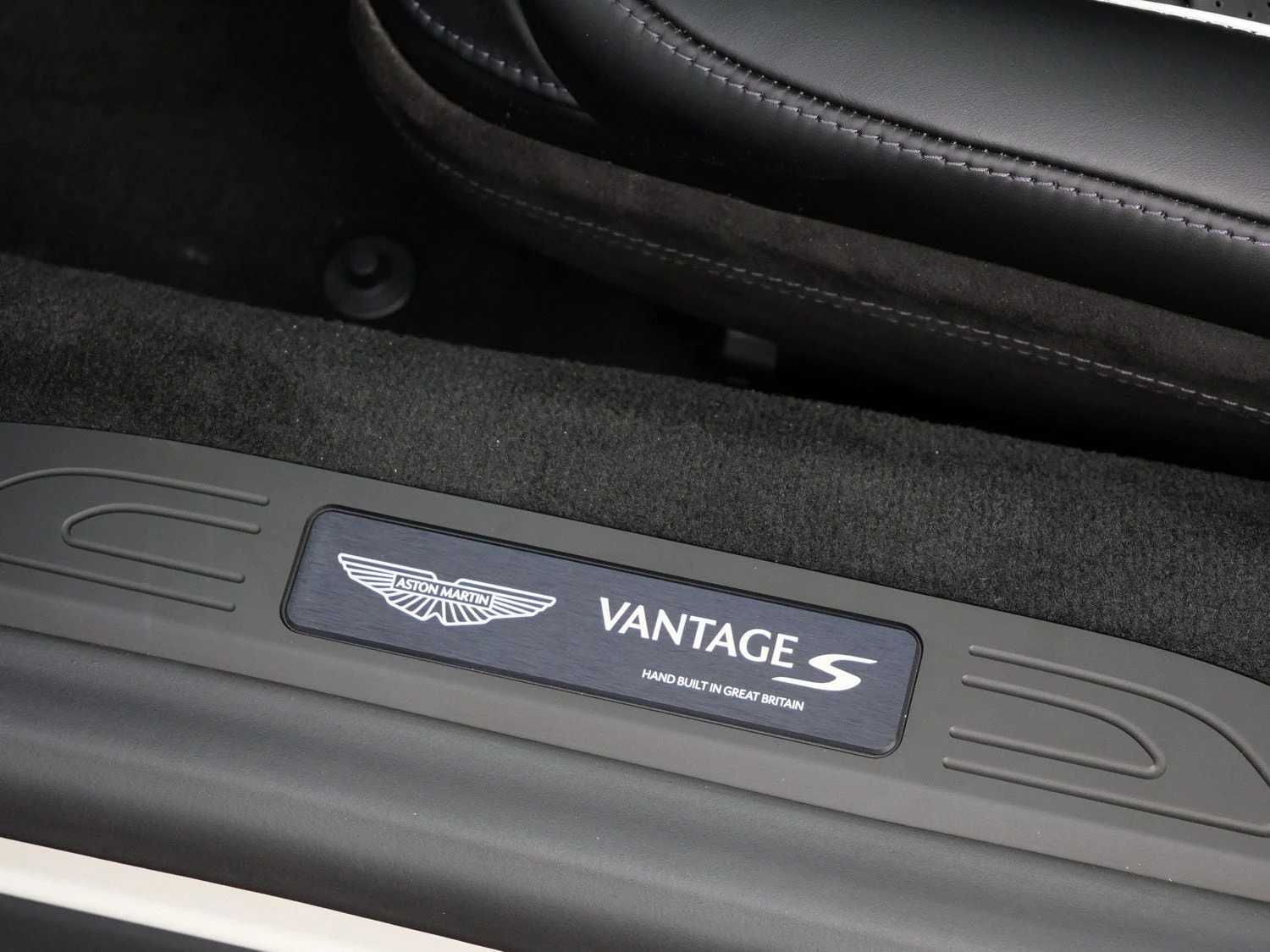 2026 Aston Martin Vantage S interior, door sill, Onyx Black - Semi Aniline / On
