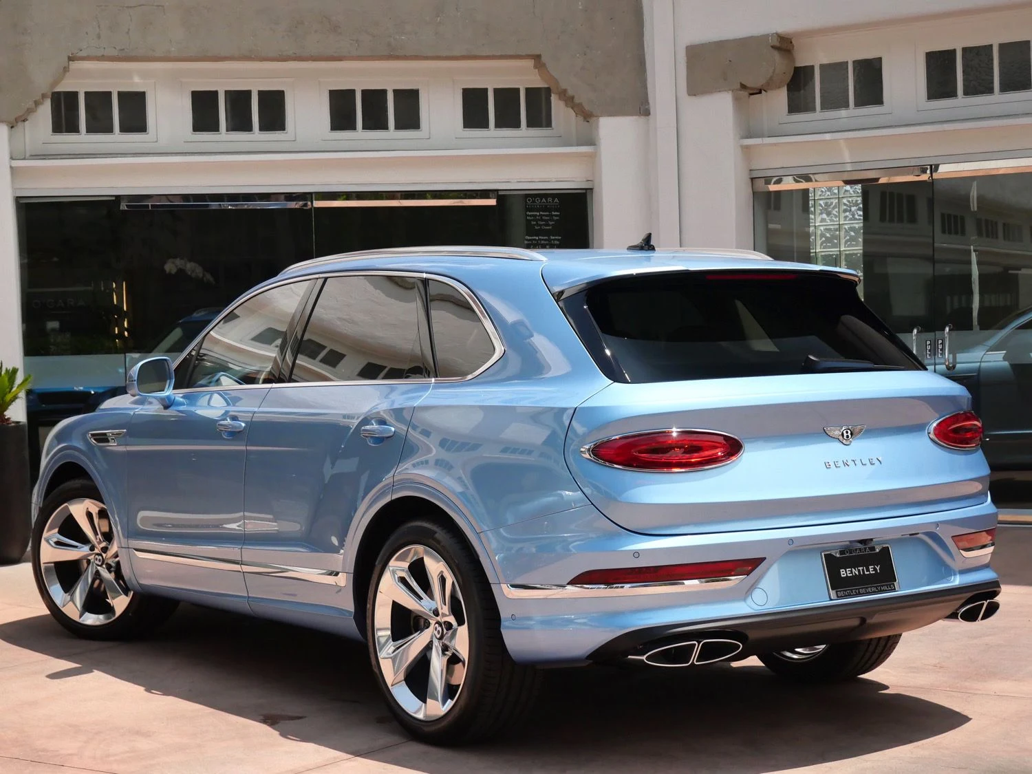 2026 Bentley Bentayga V8, rear three-quarter view, Silver