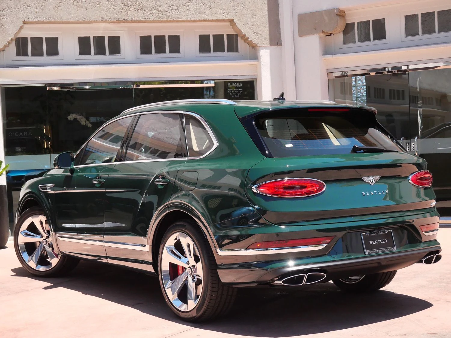 2026 Bentley Bentayga Hybrid, rear three-quarter view, Green