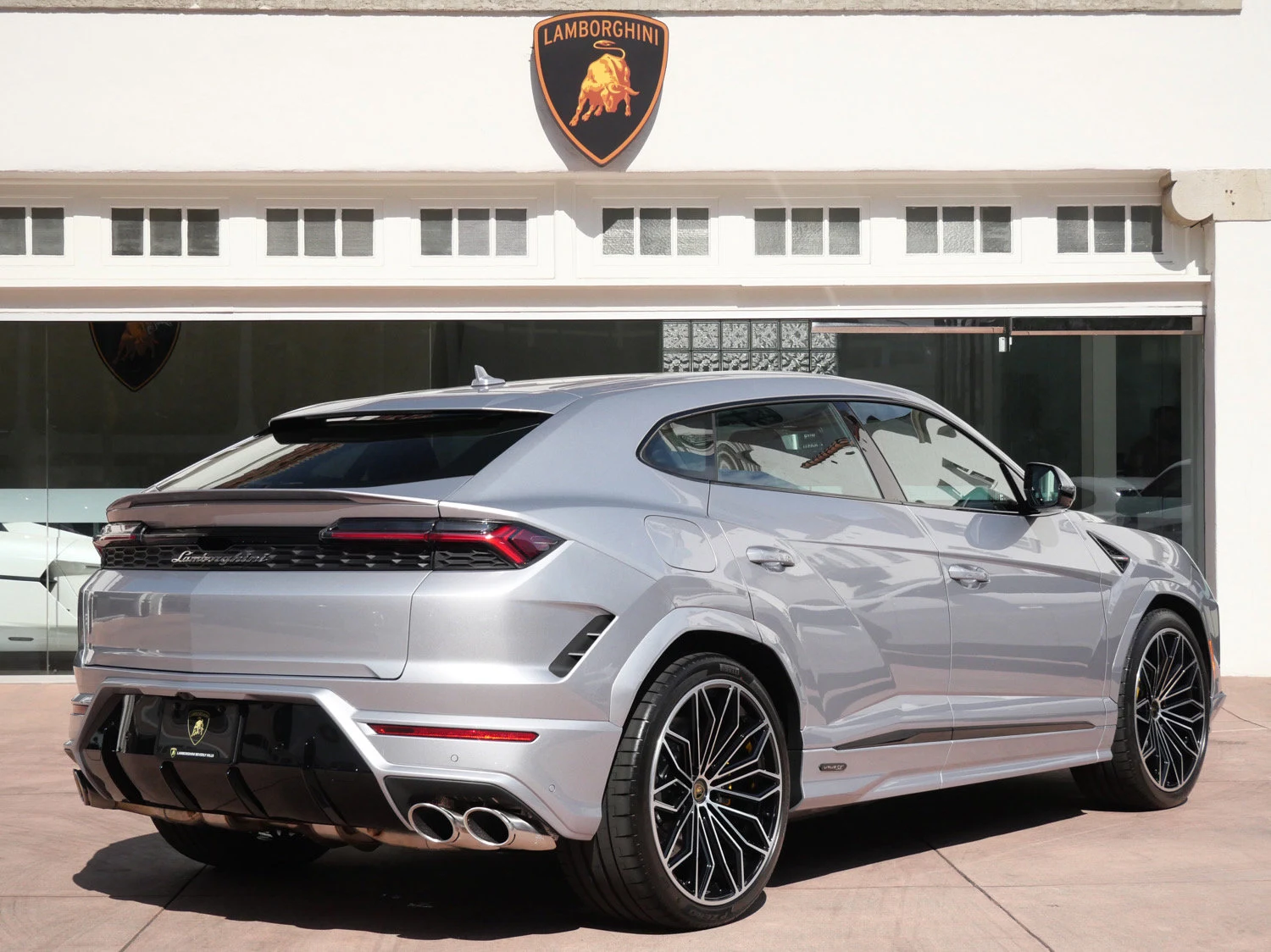 2026 Lamborghini Urus SE, rear three-quarter view, Grey