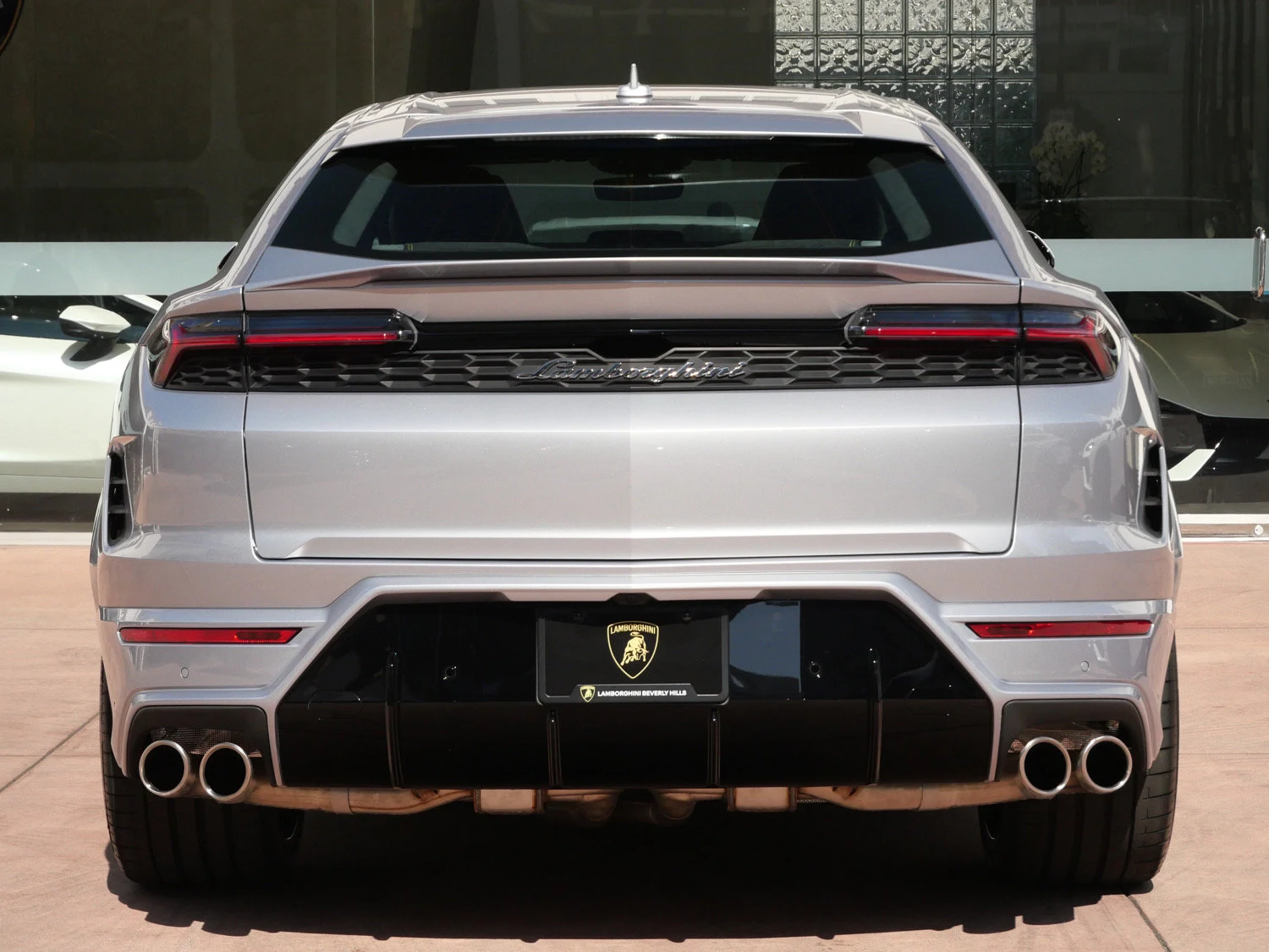 2026 Lamborghini Urus SE, rear three-quarter view, Grey