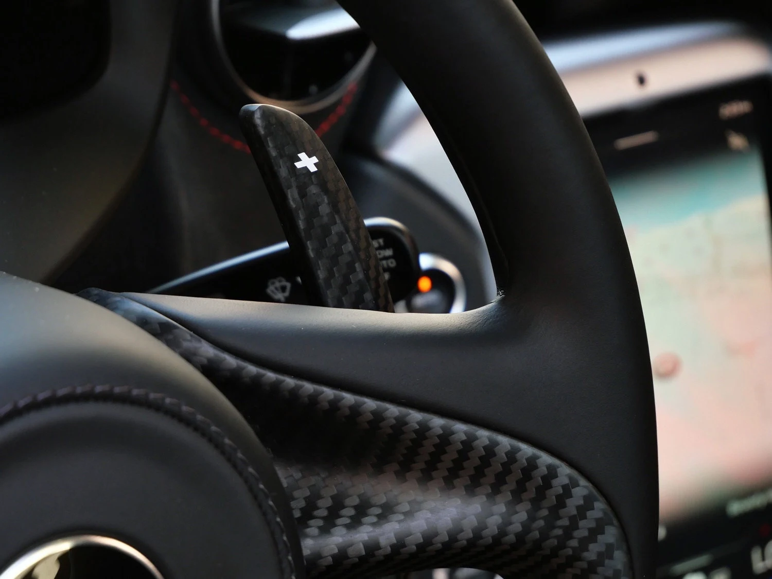 2027 McLaren 750S interior, steering wheel, Carbon Black