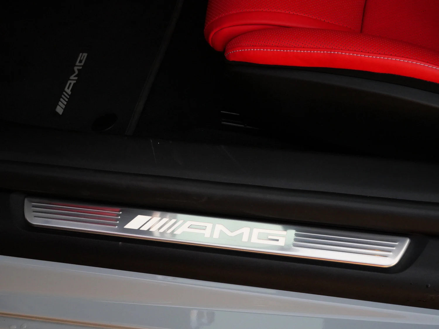 2025 Mercedes-AMG GT 63 interior, door sill, Red Pepper/Black