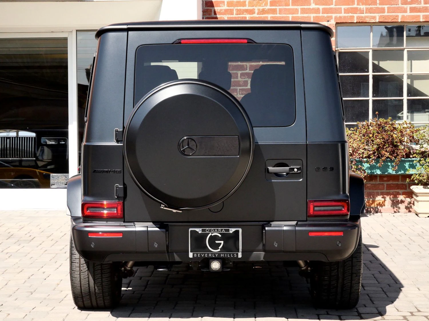 2024 Mercedes-AMG G 63, rear three-quarter view, Black