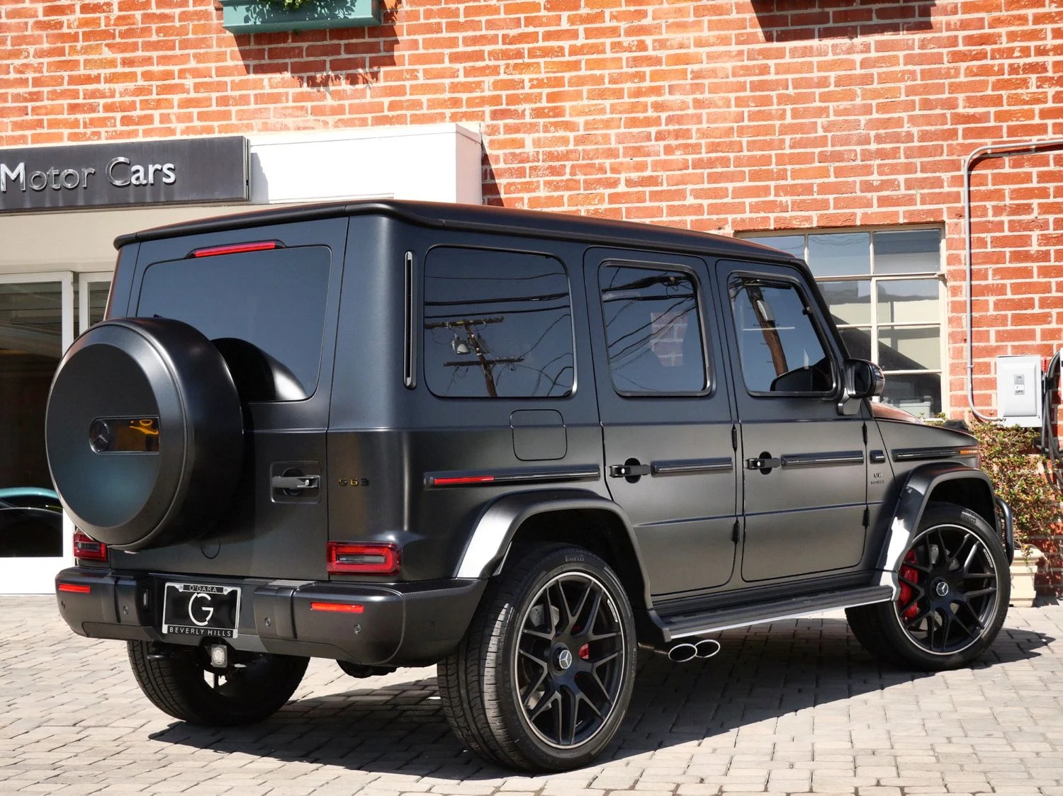 2024 Mercedes-AMG G 63, rear three-quarter view, Black