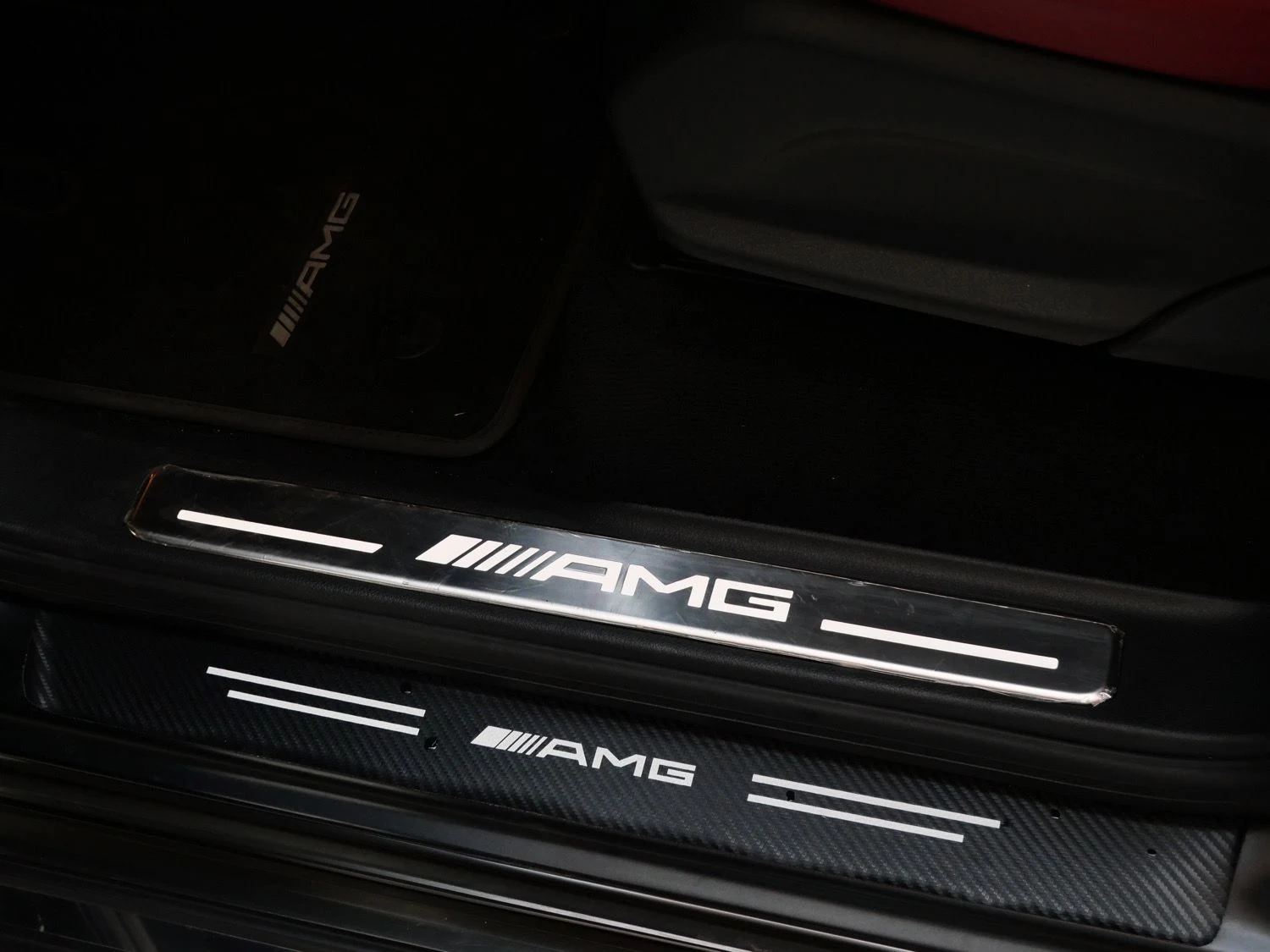 2024 Mercedes-AMG G 63 interior, door sill, Classic Red/Black
