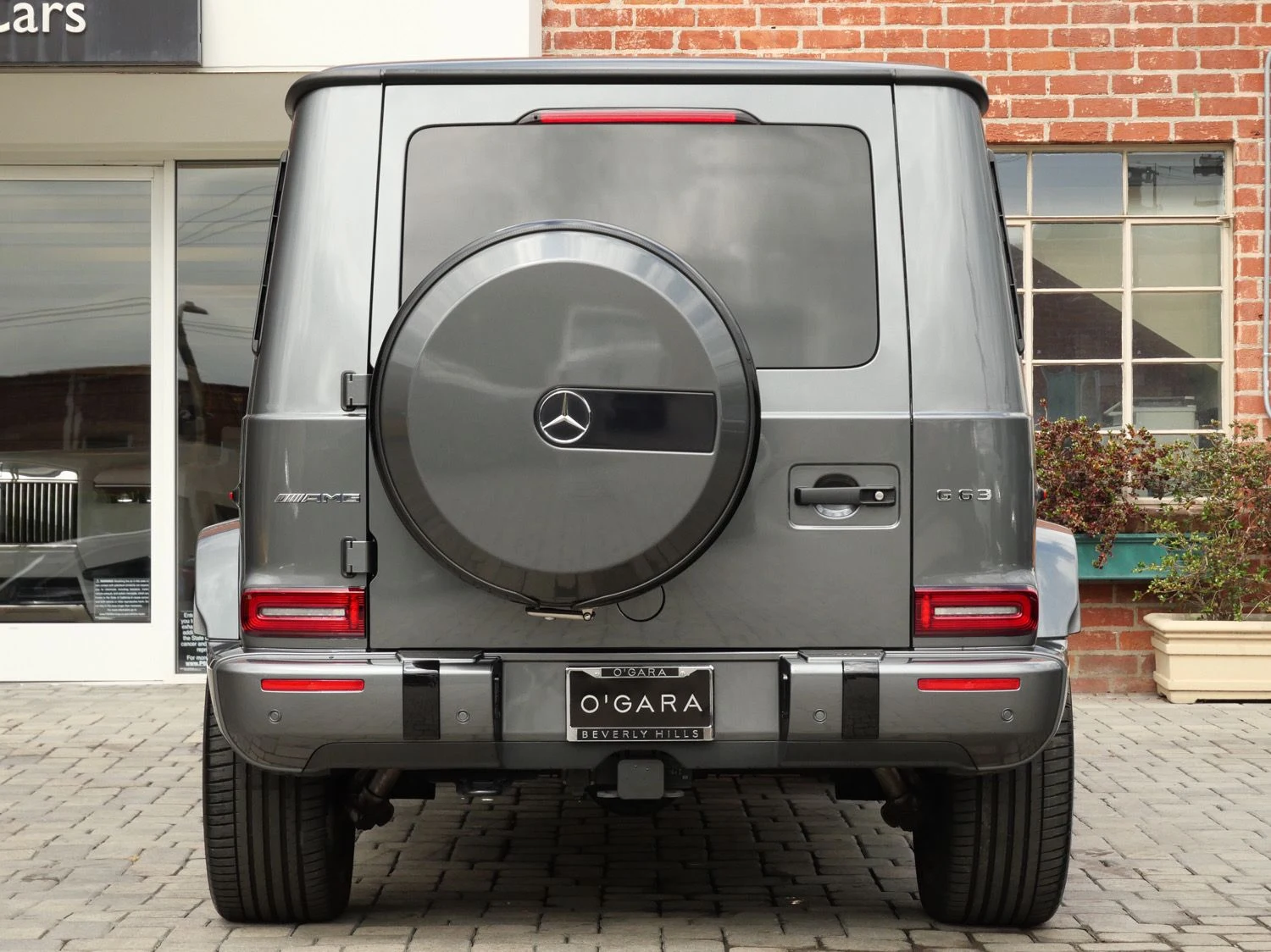 2024 Mercedes-AMG G 63, rear three-quarter view, Grey