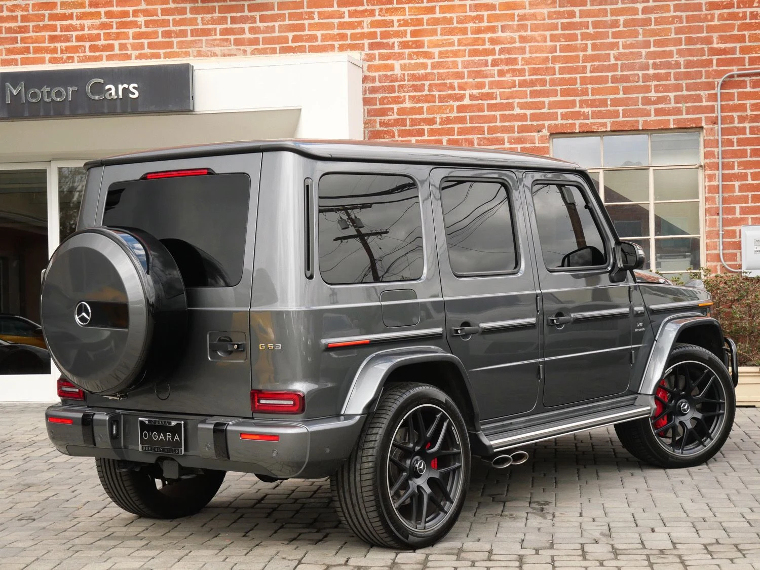 2024 Mercedes-AMG G 63, rear three-quarter view, Grey