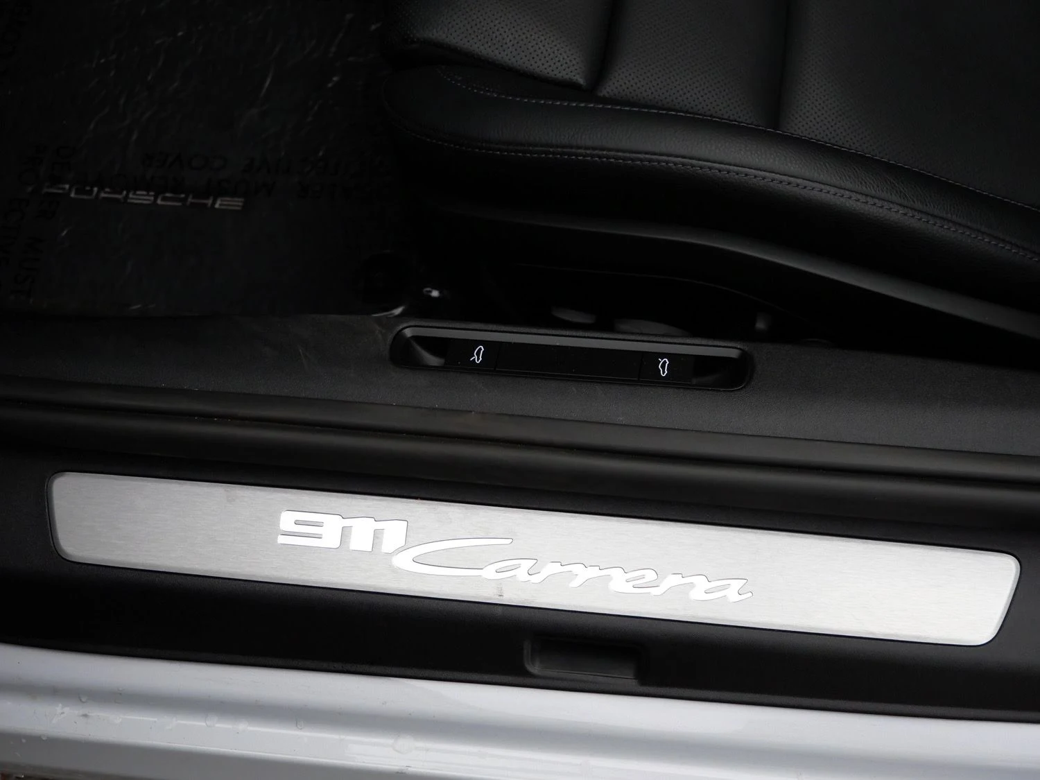 2025 Porsche 911 Carrera Cabriolet interior, door sill, Black