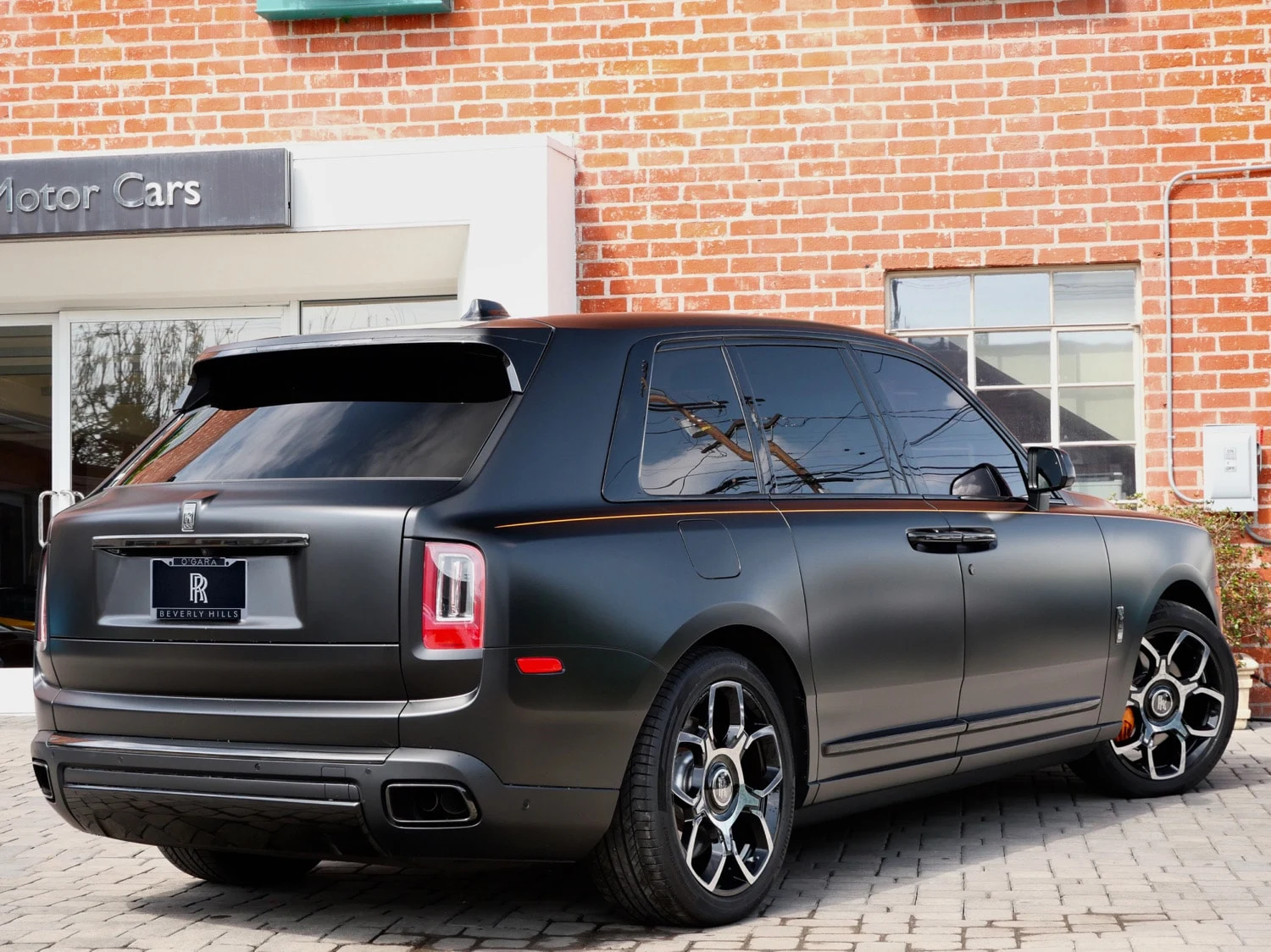 2023 Rolls-Royce Black Badge Cullinan, rear three-quarter view, Black