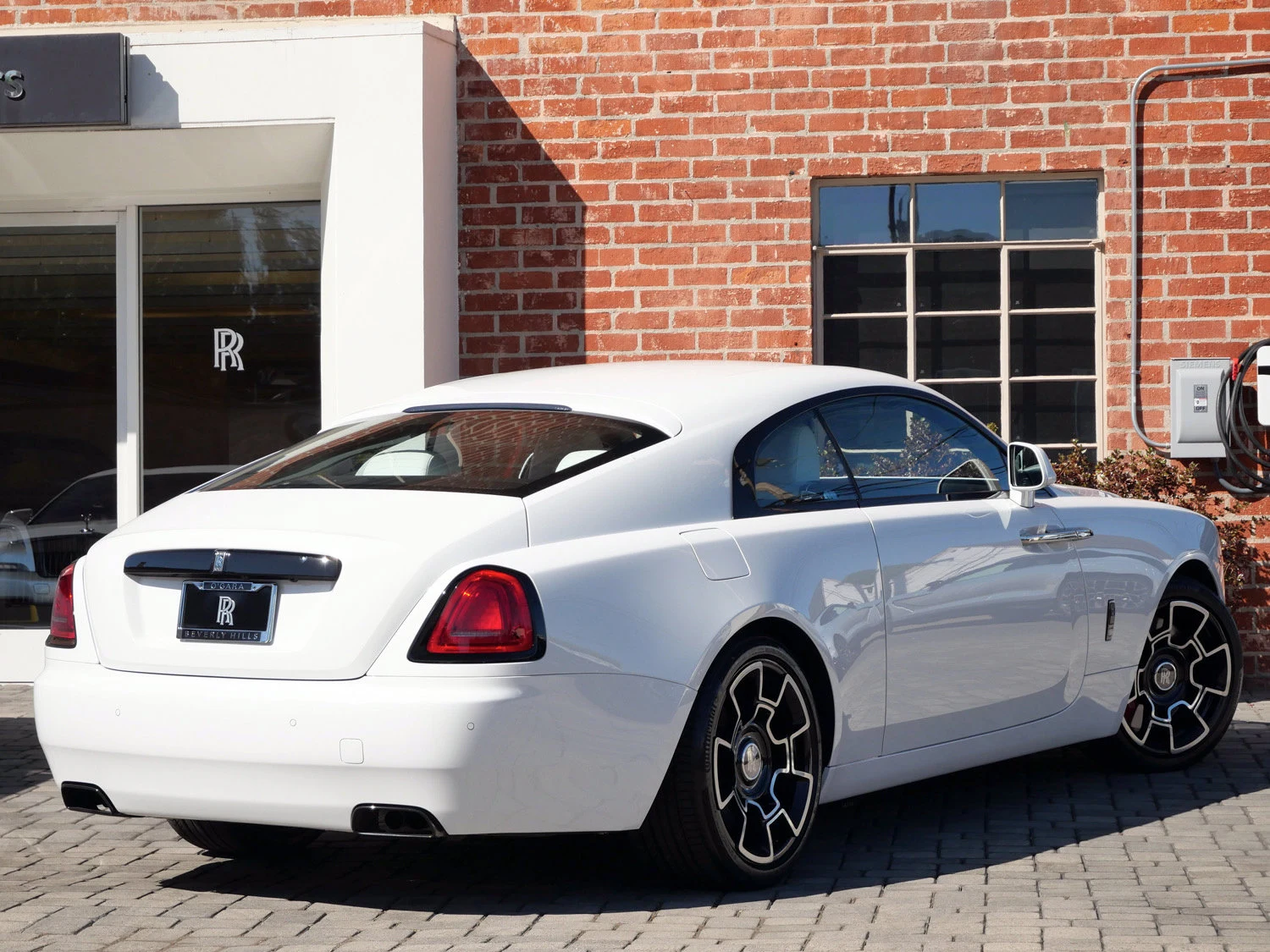 2021 Rolls-Royce Black Badge Wraith, rear three-quarter view, White