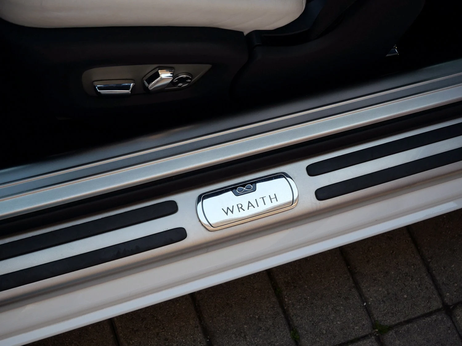 2021 Rolls-Royce Black Badge Wraith interior, door sill, Arctic White