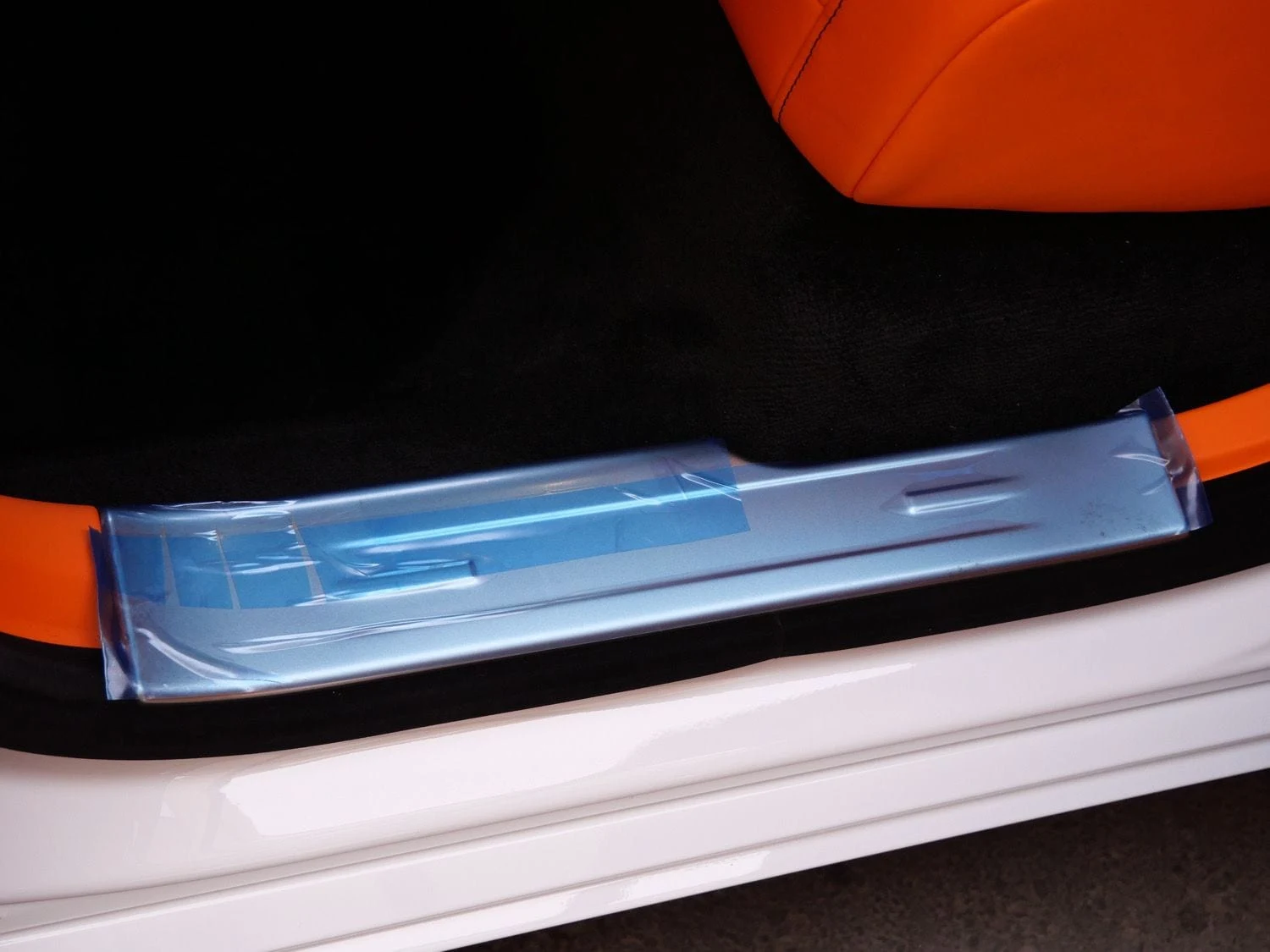 2026 Rolls-Royce Ghost interior, door sill, Mandarin