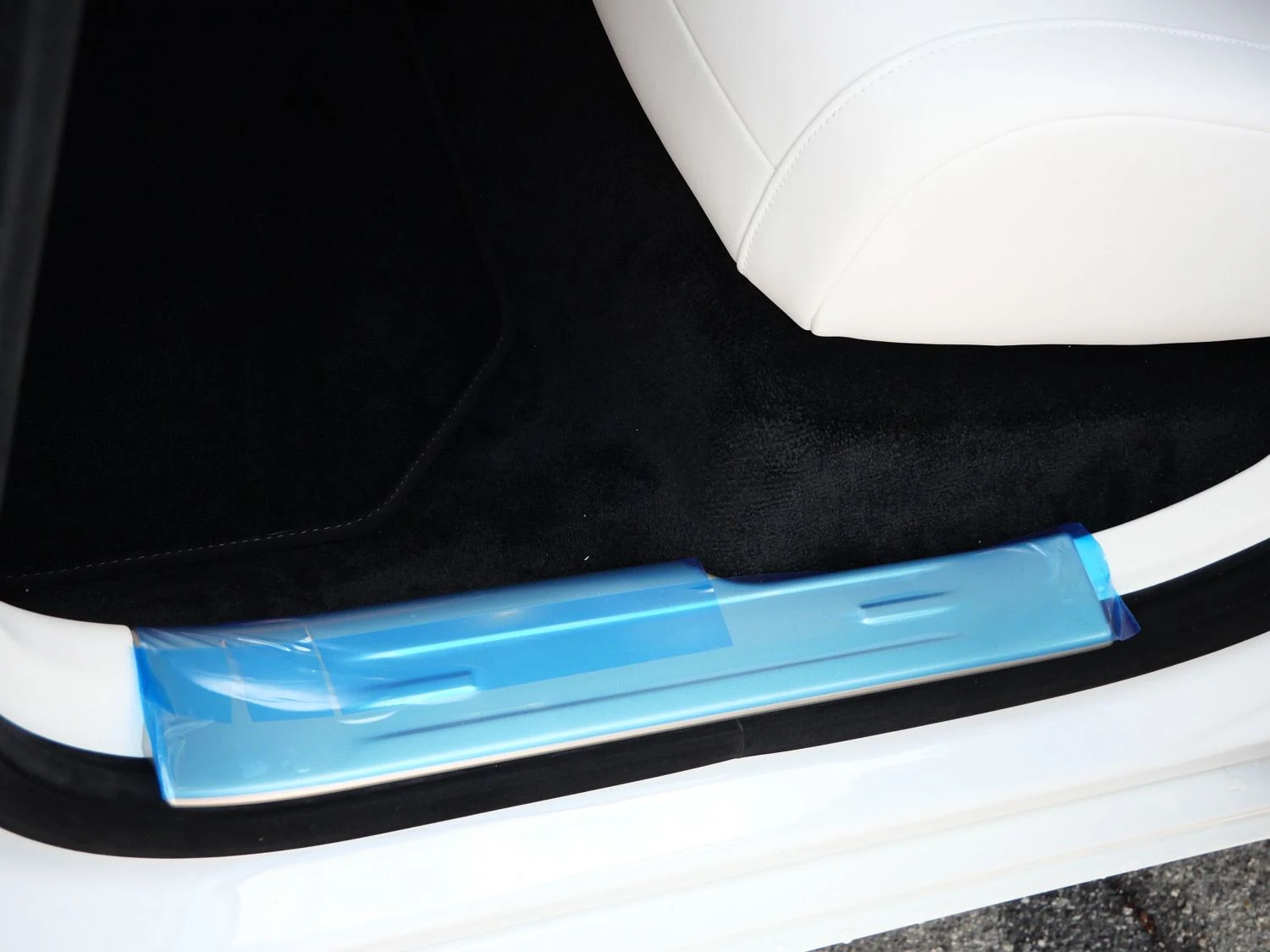 2027 Rolls-Royce Ghost interior, door sill, Grace White