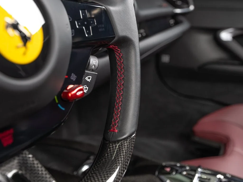 2025 Ferrari 296 GTS interior, steering wheel, Rosso Ducale