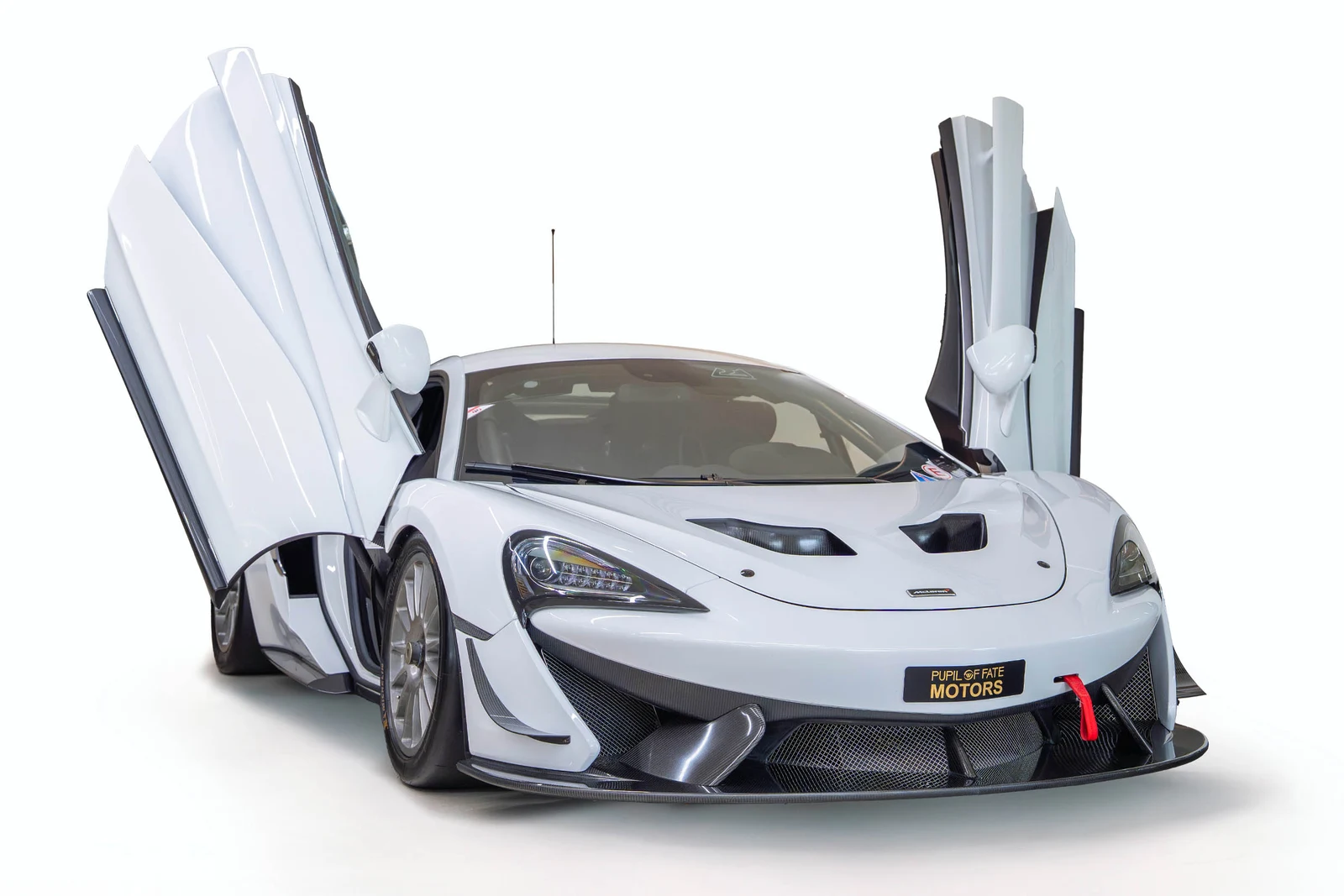 McLaren 570S GT4 · white · Pupil of Fate Motors