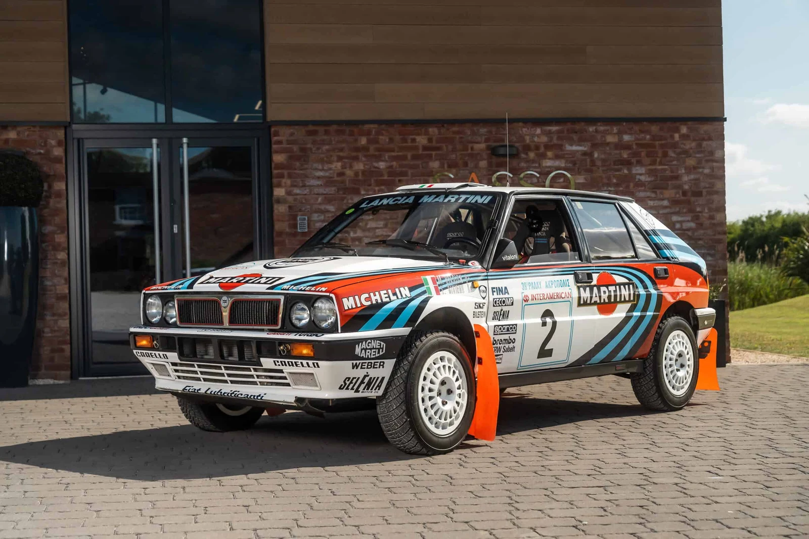Lancia Delta HF Integrale 16V Group A, full-car front three-quarter view.