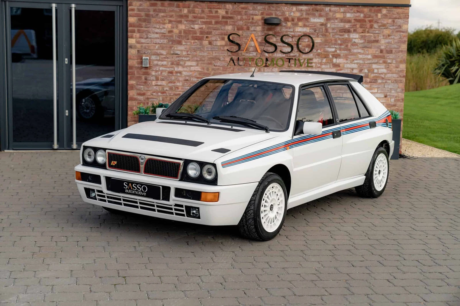 Lancia Delta Integrale Martini 5, full-car front three-quarter view.