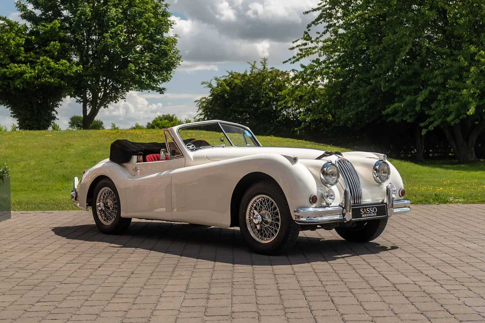 Jaguar XK140 SE DHC, 4/10