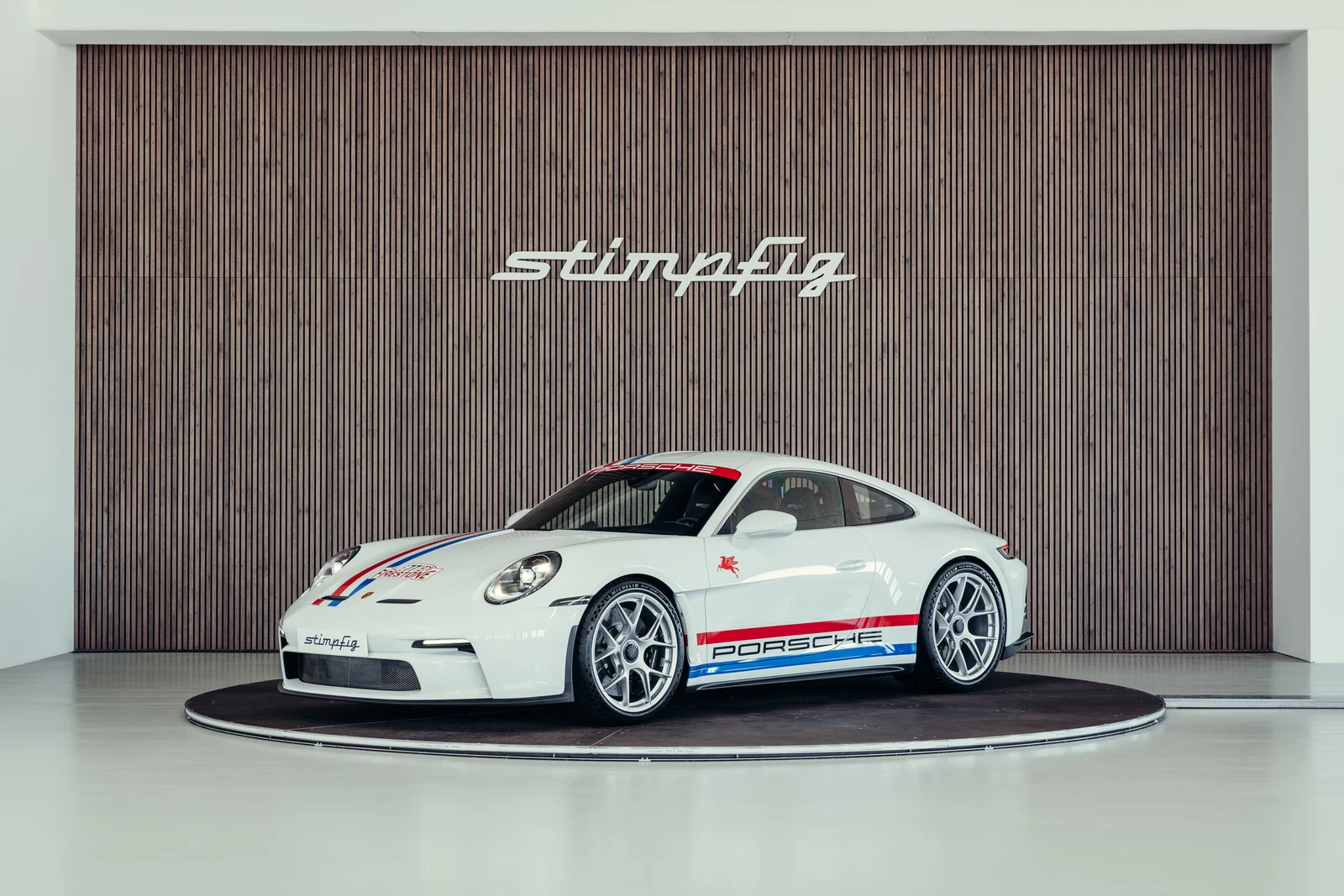 Porsche 911 (992.1) S/T, full-car front three-quarter view.