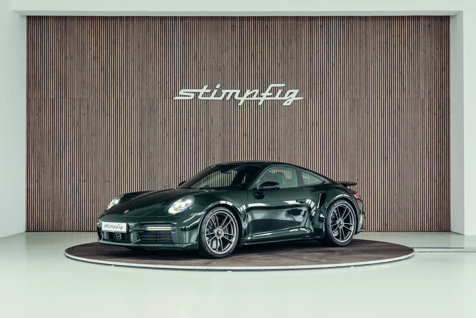 Porsche 911 (992.1) Turbo S, full-car front three-quarter view.