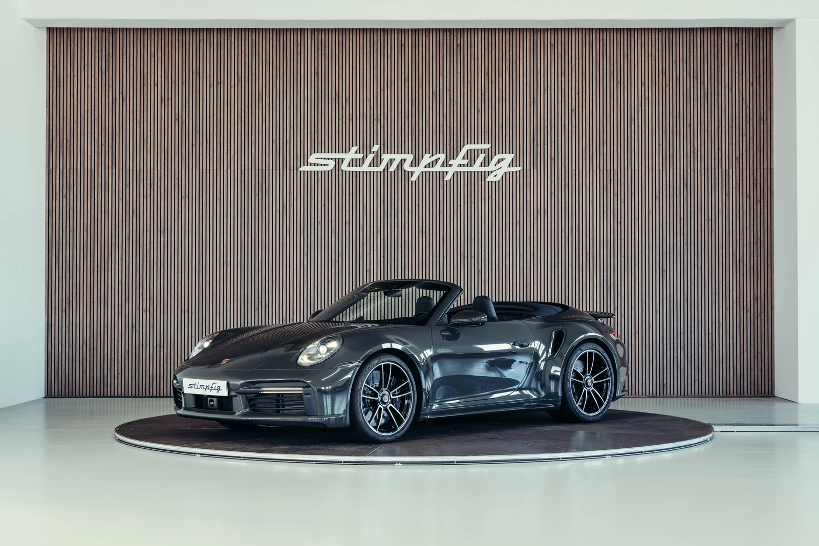 Porsche 911 (992.1) Turbo S Cabriolet, full-car front three-quarter view.