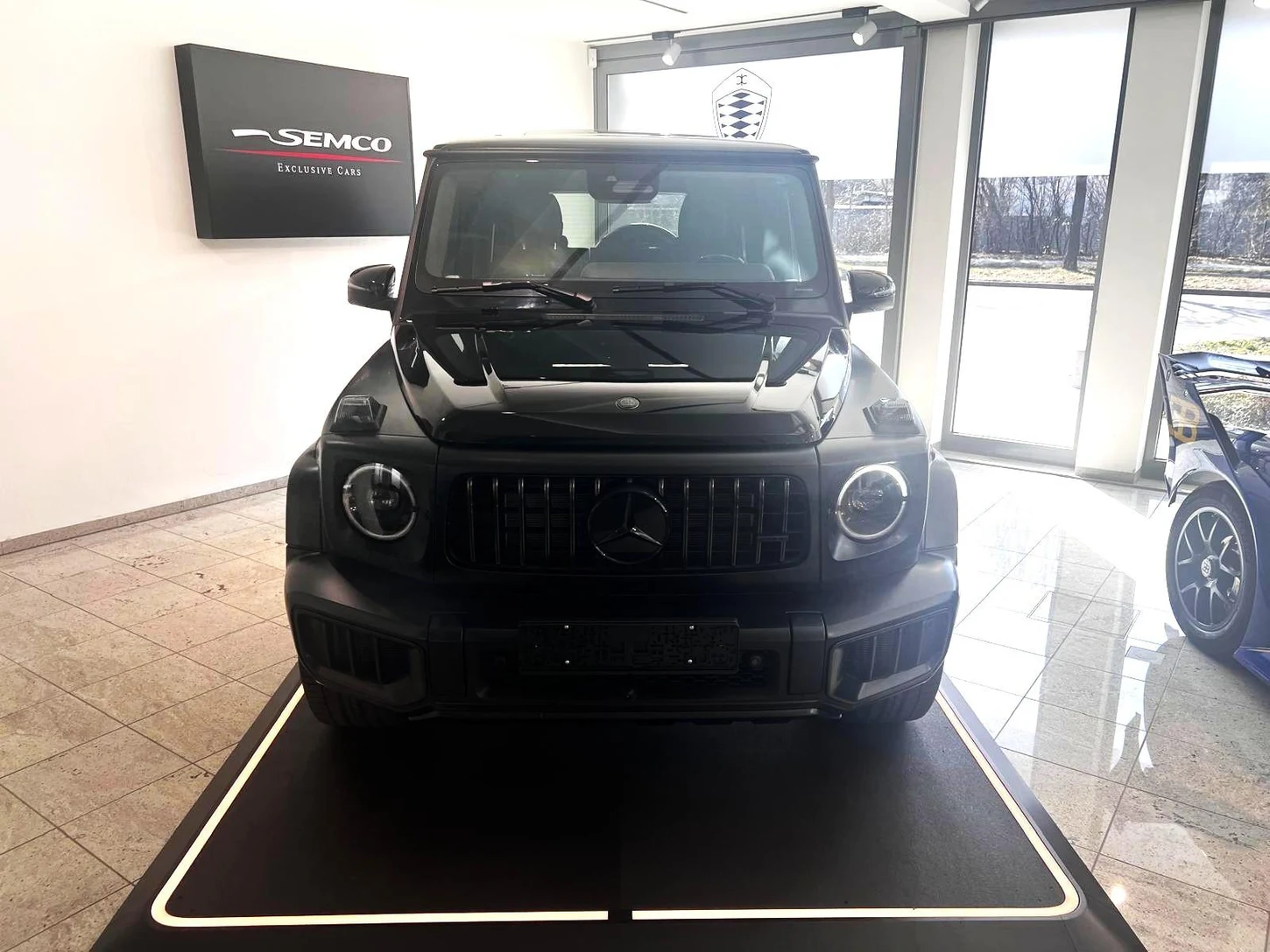 Mercedes-Benz G 63 AMG, full-car front view.