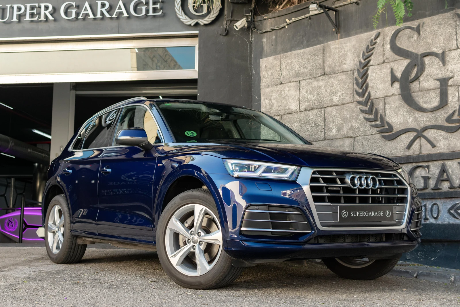 Audi Q5 40 TDI quattro S line · Navarra Blue · SuperGarage Marbella