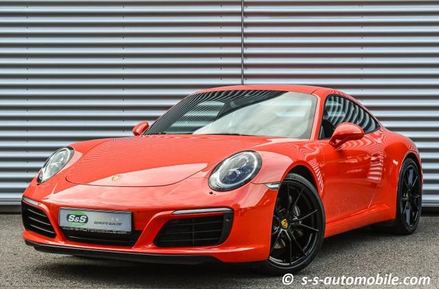 Porsche 911 (991) Carrera, full-car front three-quarter view.