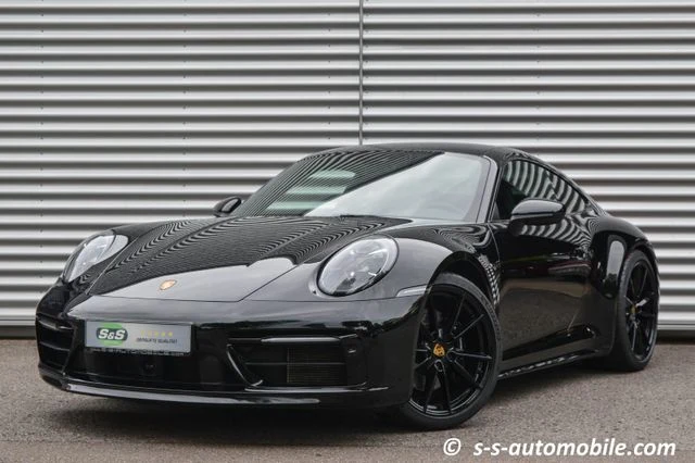 Porsche 911 (992) Carrera S, full-car front three-quarter view.