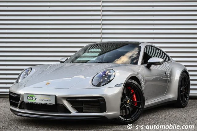 Porsche 911 (992) Carrera GTS, full-car front three-quarter view.