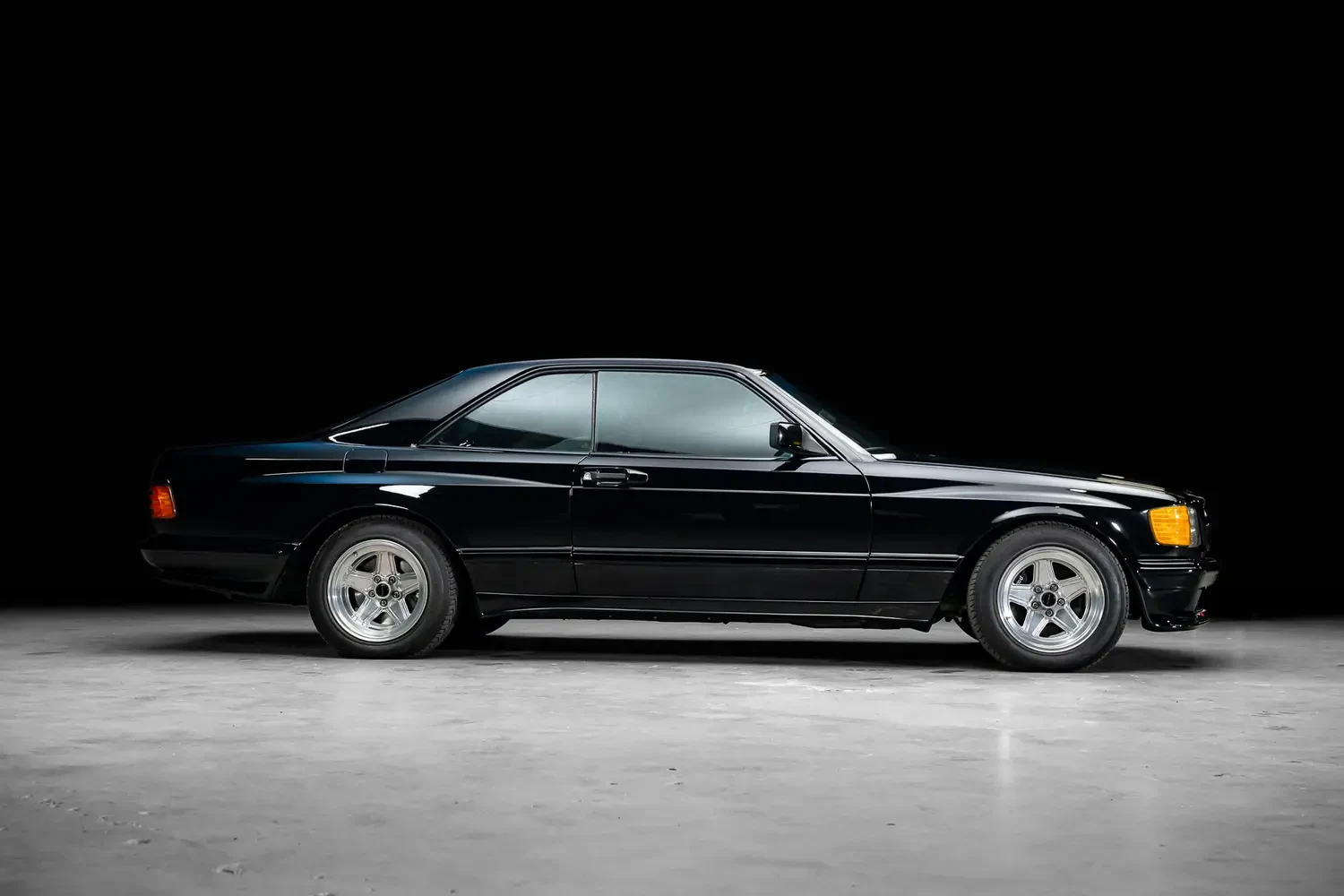 1987 Mercedes-Benz 560 SEC AMG 6.0, side profile, Black