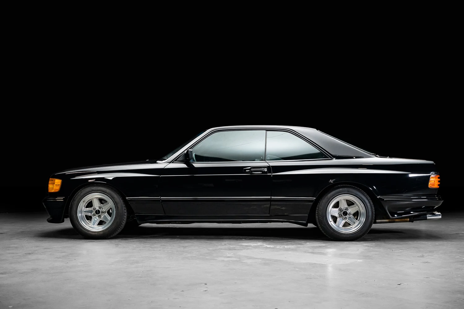 1987 Mercedes-Benz 560 SEC AMG 6.0, side profile, Black