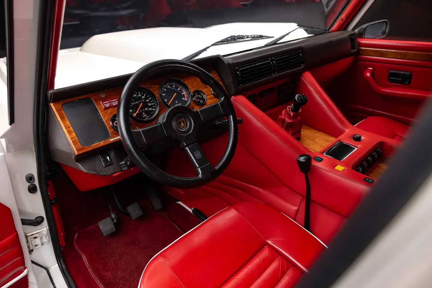 1990 Lamborghini LM002 interior, dashboard, Rosso and Bianco