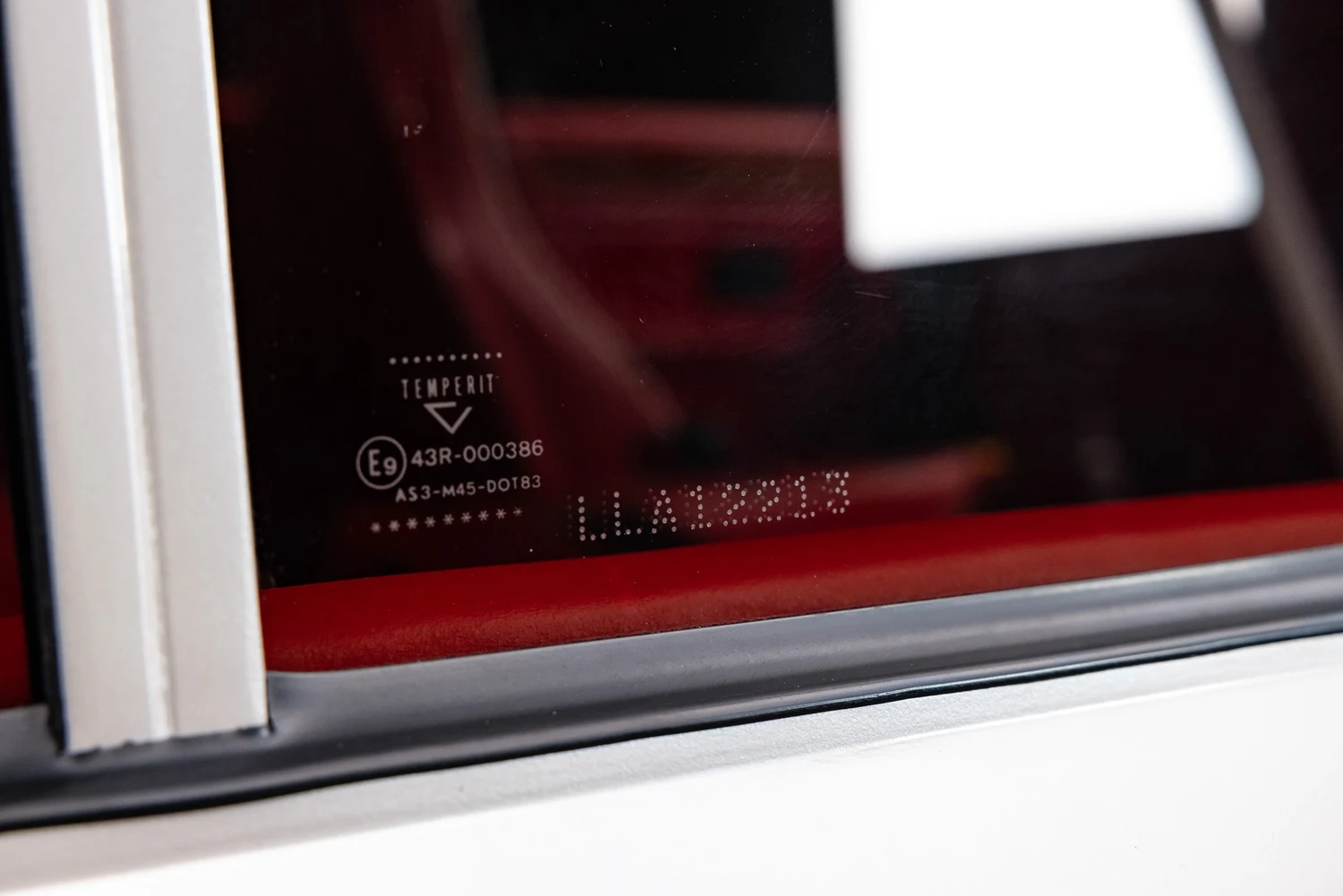 1990 Lamborghini LM002 interior, door sill, Rosso and Bianco