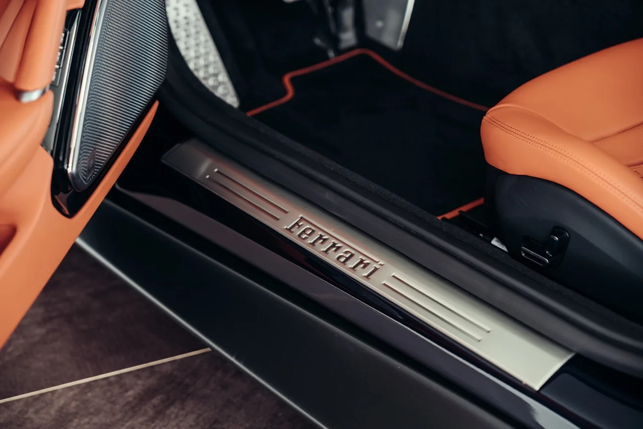 2024 Ferrari Roma Spider interior, door sill, Brown