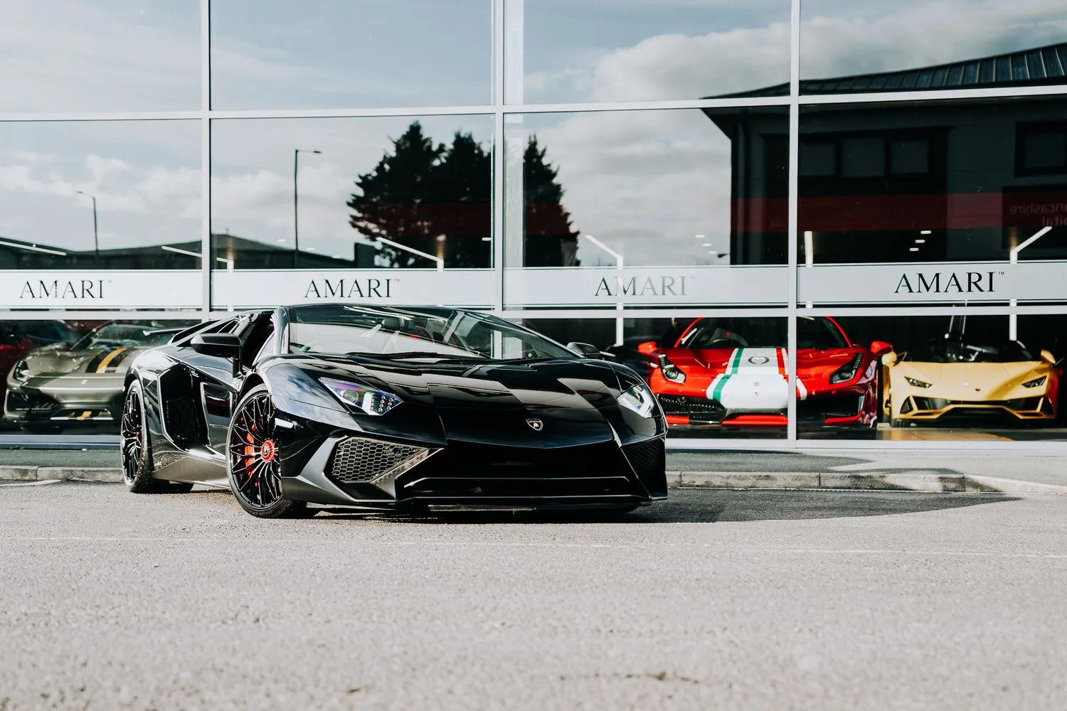 2016 Lamborghini Aventador SV Roadster for sale, exterior, Nero Cosmus w/ Rosso Alala