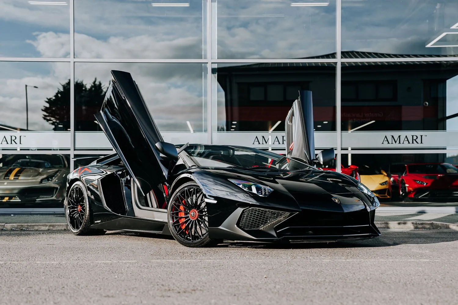 2016 Lamborghini Aventador SV Roadster for sale, exterior, Nero Cosmus w/ Rosso Alala