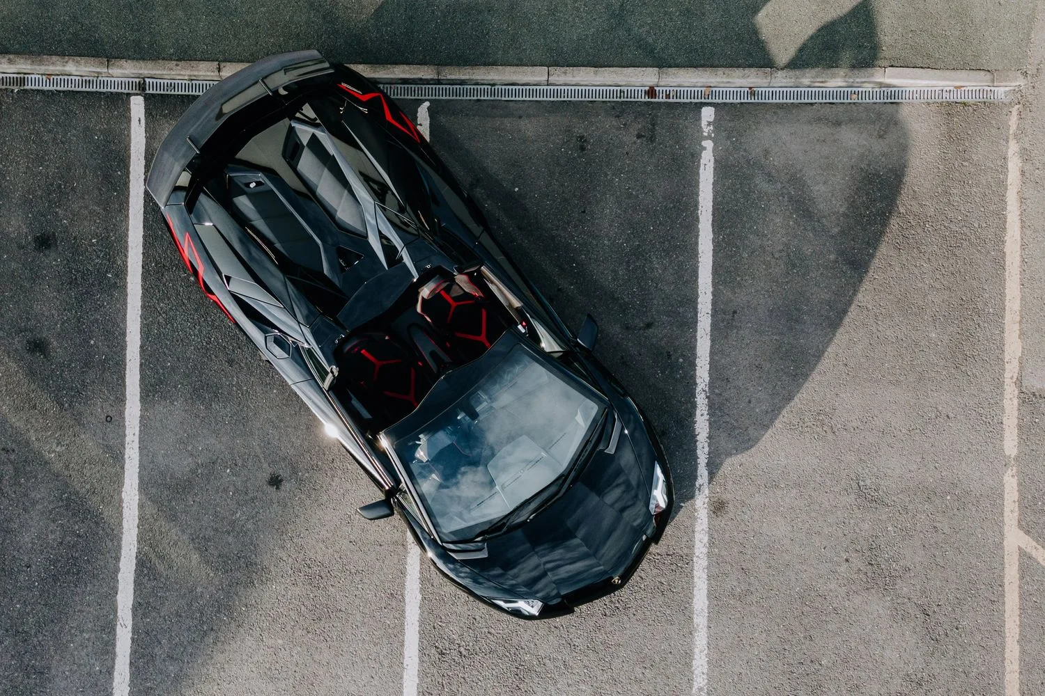 2016 Lamborghini Aventador SV Roadster for sale, exterior, Nero Cosmus w/ Rosso Alala