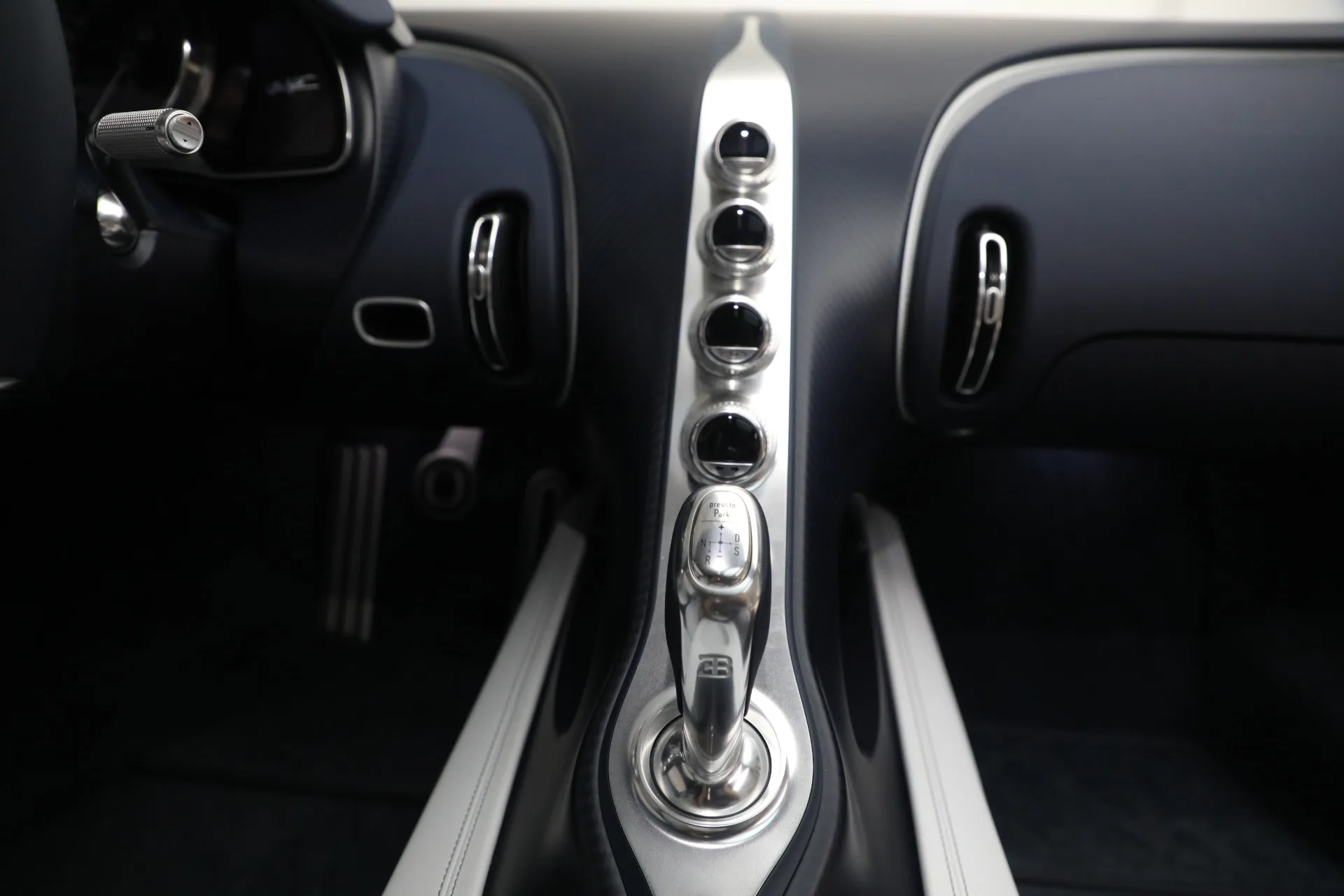 2020 Bugatti Chiron Sport interior, center console, Argent & Blue Royal Carbon Fiber