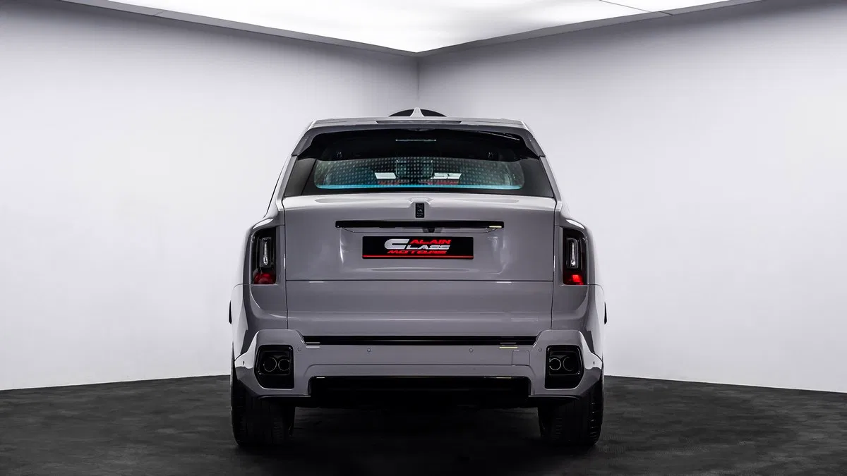2024 Rolls-Royce Cullinan Black Badge, rear three-quarter view, Grey