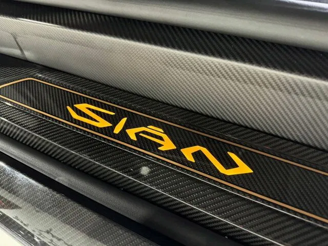 2021 Lamborghini Sian Roadster interior, door sill, Black with hexagonal accents