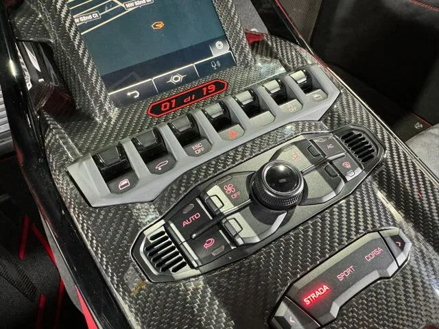 2021 Lamborghini Sian Roadster interior, center console, Black with hexagonal accents