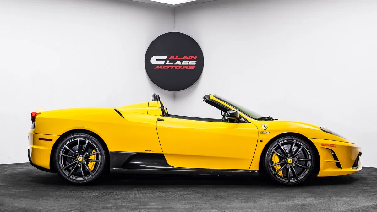 2009 Ferrari F430 Scuderia Spider 16M, side profile, Giallo Modena