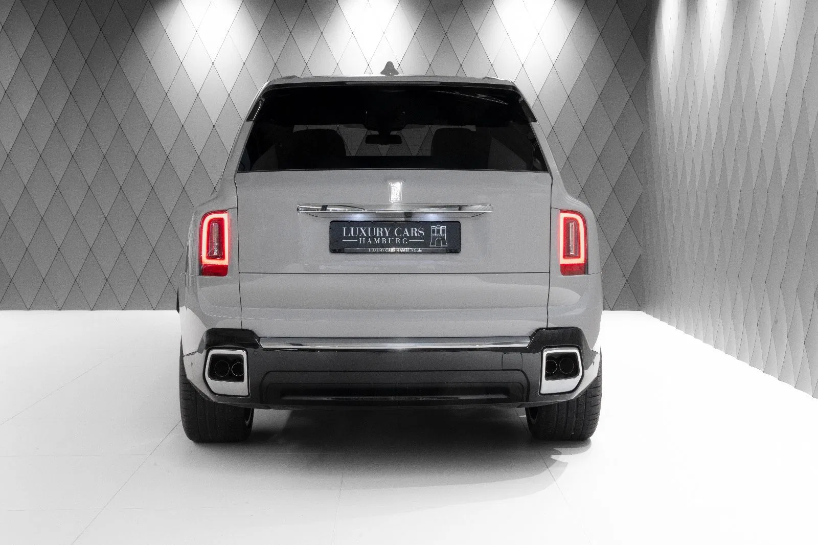2025 Rolls-Royce Black Badge Cullinan Series II, rear three-quarter view, Tempest Grey
