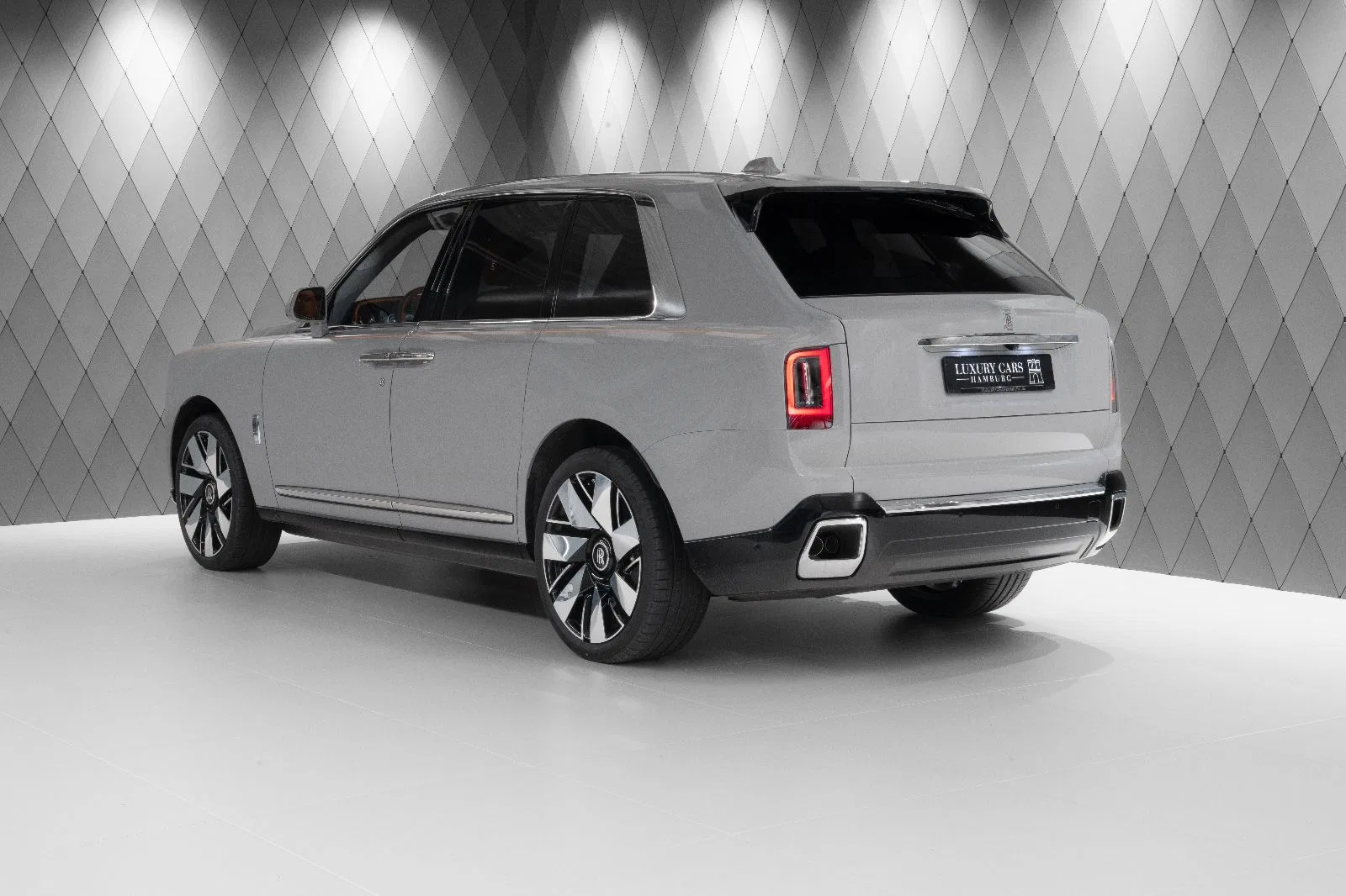 2025 Rolls-Royce Black Badge Cullinan Series II, rear three-quarter view, Tempest Grey