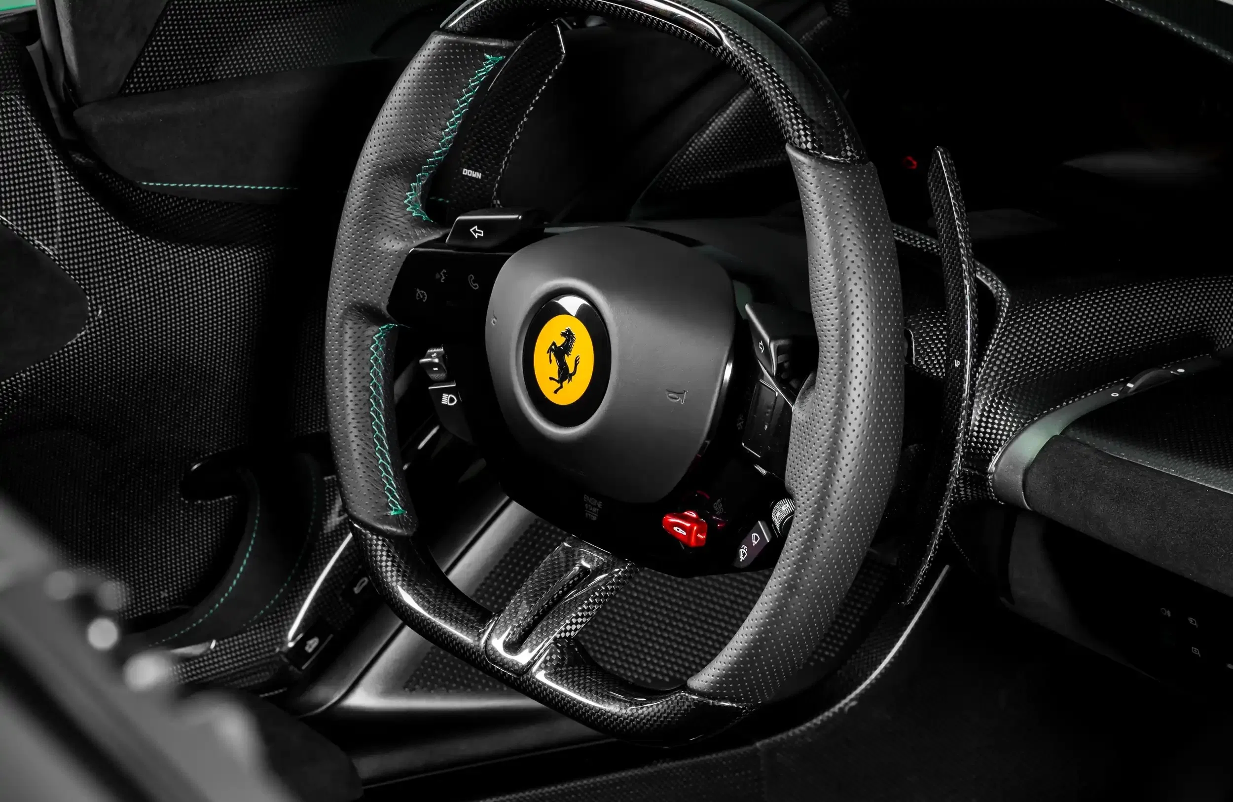 2023 Ferrari Daytona SP3 interior, steering wheel, Black leather with carbon fiber accents