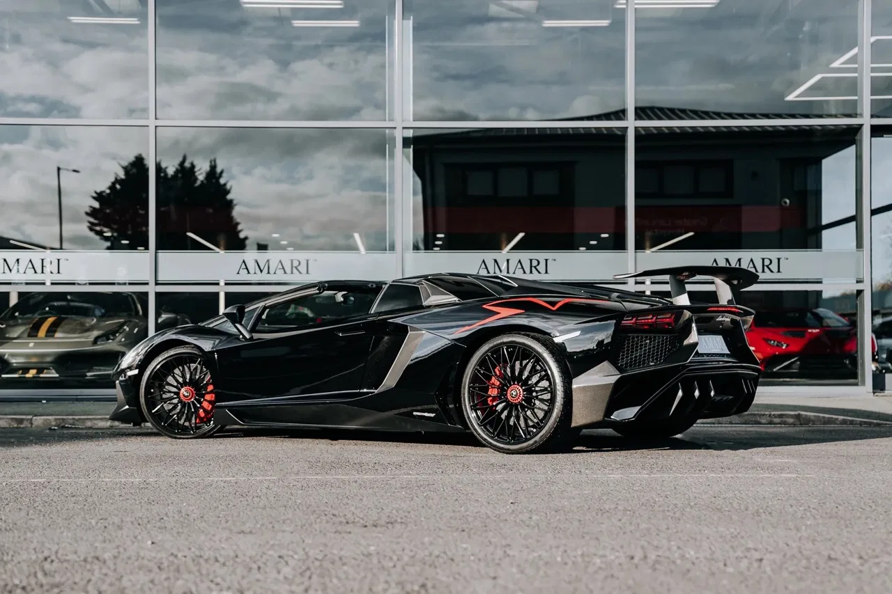 2016 Lamborghini Aventador SV Roadster for sale, exterior, Nero Cosmus w/ Rosso Alala